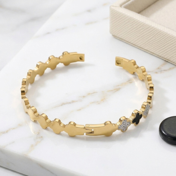 Liora - Stainless Steel Quatrefoil Accent Hinged Bangle Bracelet