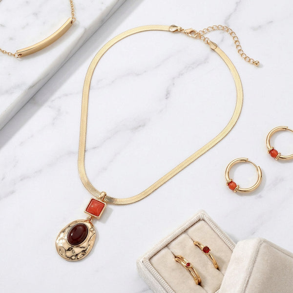 Kaelie - Hammered Metal Oval Frame Herringbone Necklace